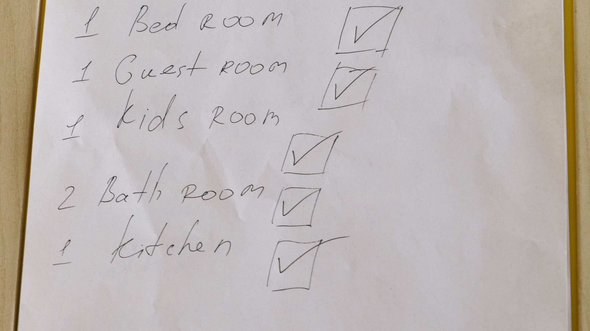 A checklist page clipped to a white clipboard.